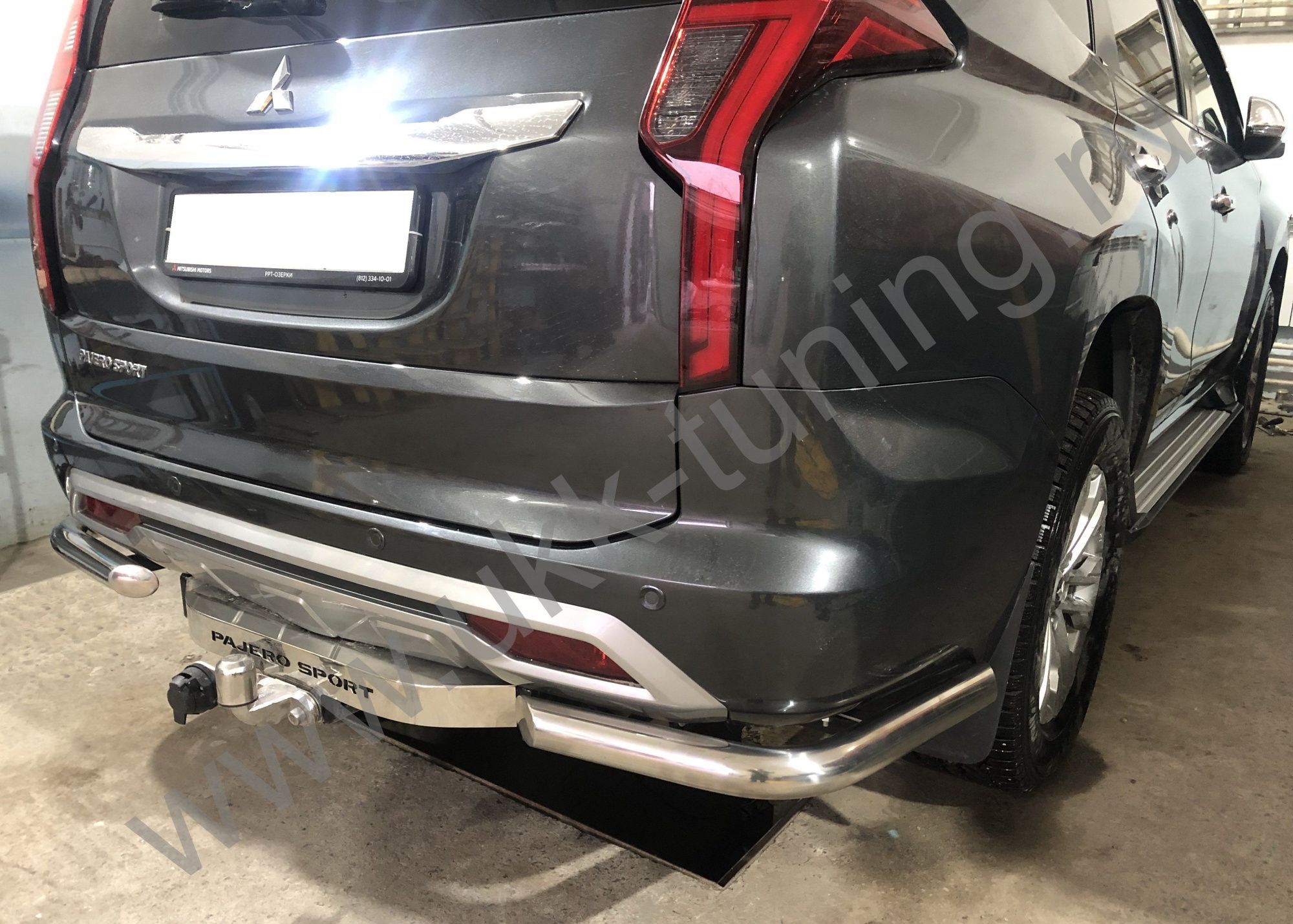 Защита заднего бампера угловая Mitsubishi Pajero Sport с 2021 Защита заднего бампера угловая Mitsubishi Pajero Sport с 2021